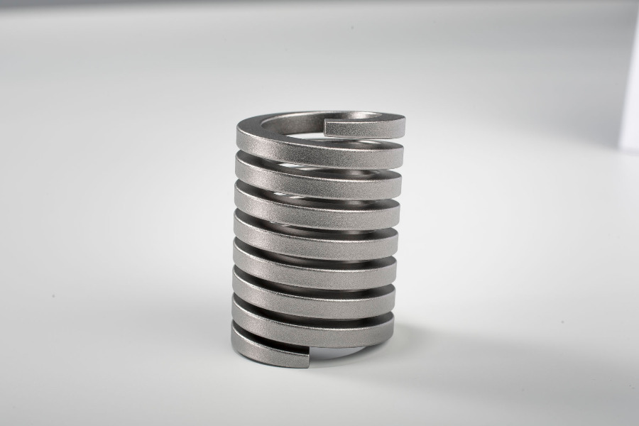 Drehfeder mit spannungsoptimierten Drahtquerschnitt Drehfeder mit spannungsoptimierten Drahtquerschnitt