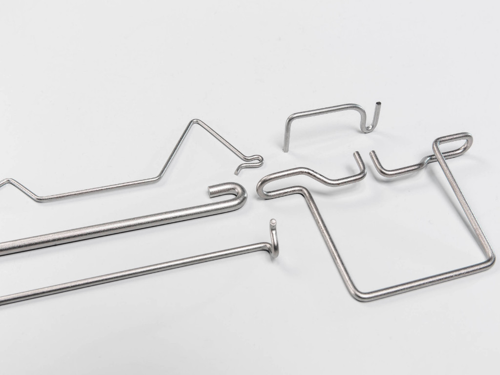 Gruppenbild Drahtbiegeteile/Drehstabfedern Drahtbiegeteile/Drehstabfedern